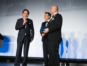 (Left) Successful bidder of the auction prize, a Seiko watch (Right) The sponsor of the prize